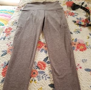 Beyond yoga out of pocket high waisted midi leggin